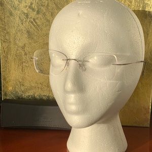 Silhouette Titanium Rimless Frames in brushed gunmetal.